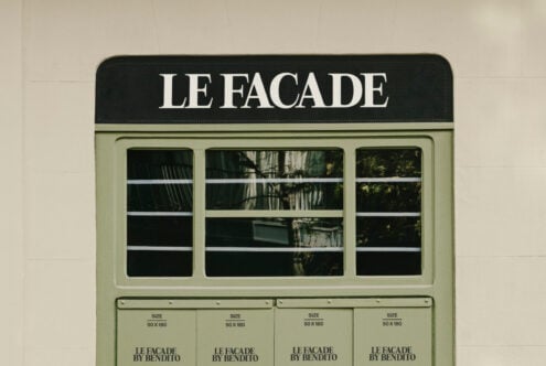 Sage green storefront mockup with Le Facade branding, three display windows with product sizing