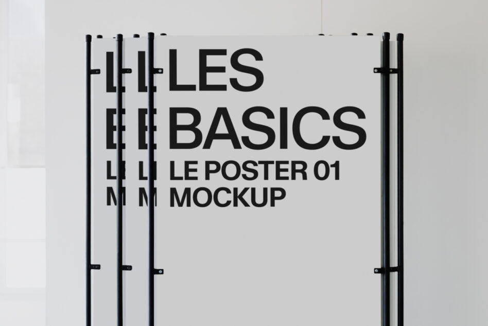 Stacked light posters with black text reading Les Basics Le Poster 01 Mockup