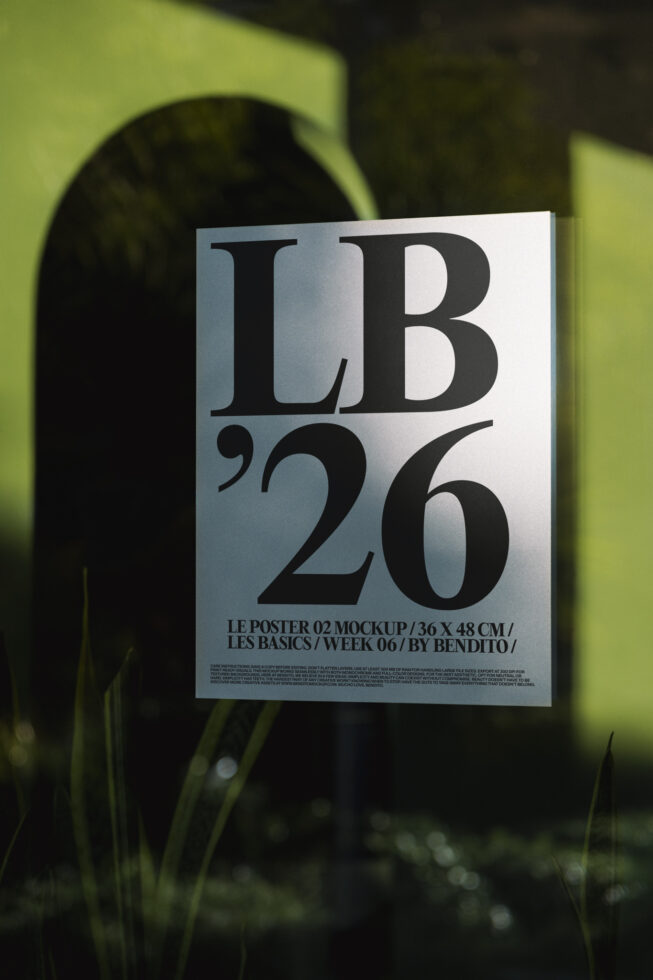 Light poster mockup with LB'26 in gradient metallic lettering, plants in background