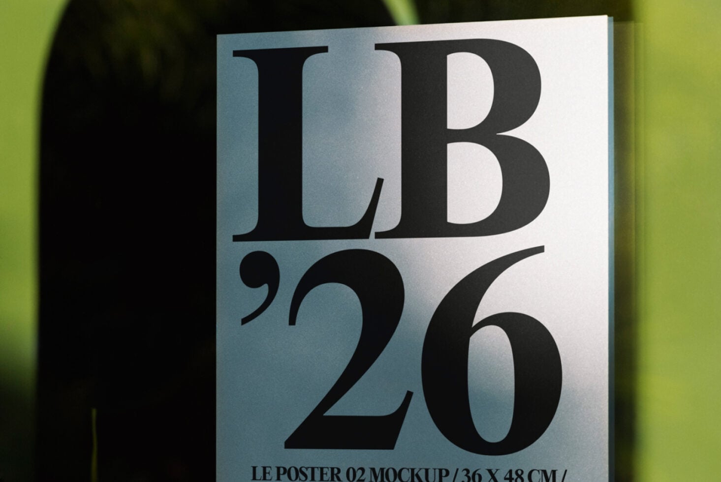Light poster mockup with LB'20 in gradient metallic lettering, bright background