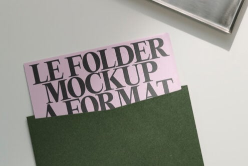 Green folder with pink insert mockup featuring overlapping text layout