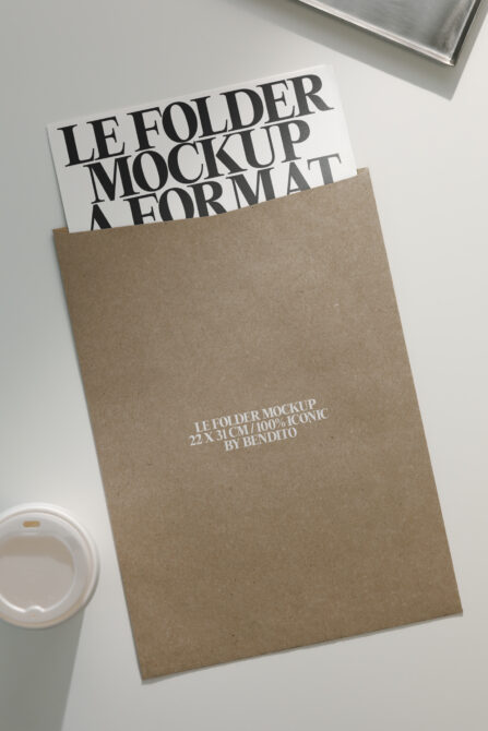Kraft folder mockup with white insert sheet displaying bold serif typography