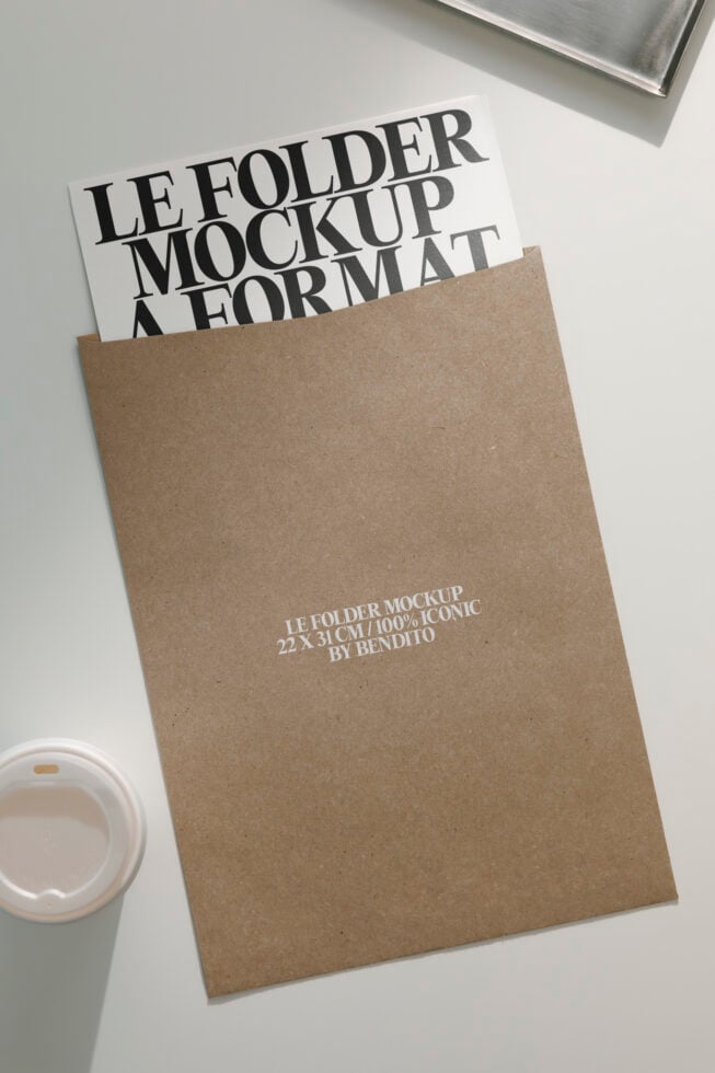 Kraft folder mockup with white insert sheet displaying bold serif typography