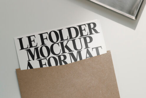 Kraft folder with white insert showing stacked serif lettering mockup