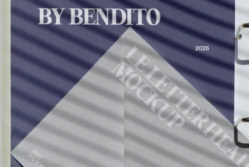 Close-up of folded letterhead mockup on dark blue fabric backdrop