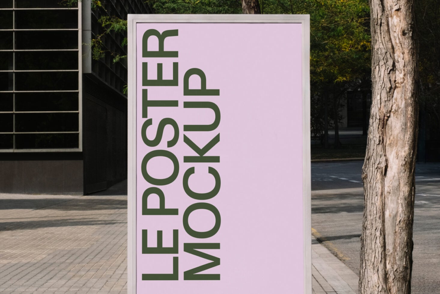 Pink poster mockup in street setting with architectural backdrop