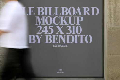 Dark billboard mockup on concrete wall showing text with pedestrian passing
