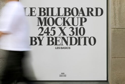 White billboard mockup on building with blurred person in red skirt walking