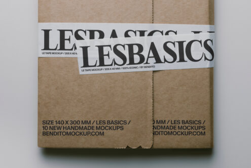 Kraft colored mailer mockup with Les Basics white tape label across middle