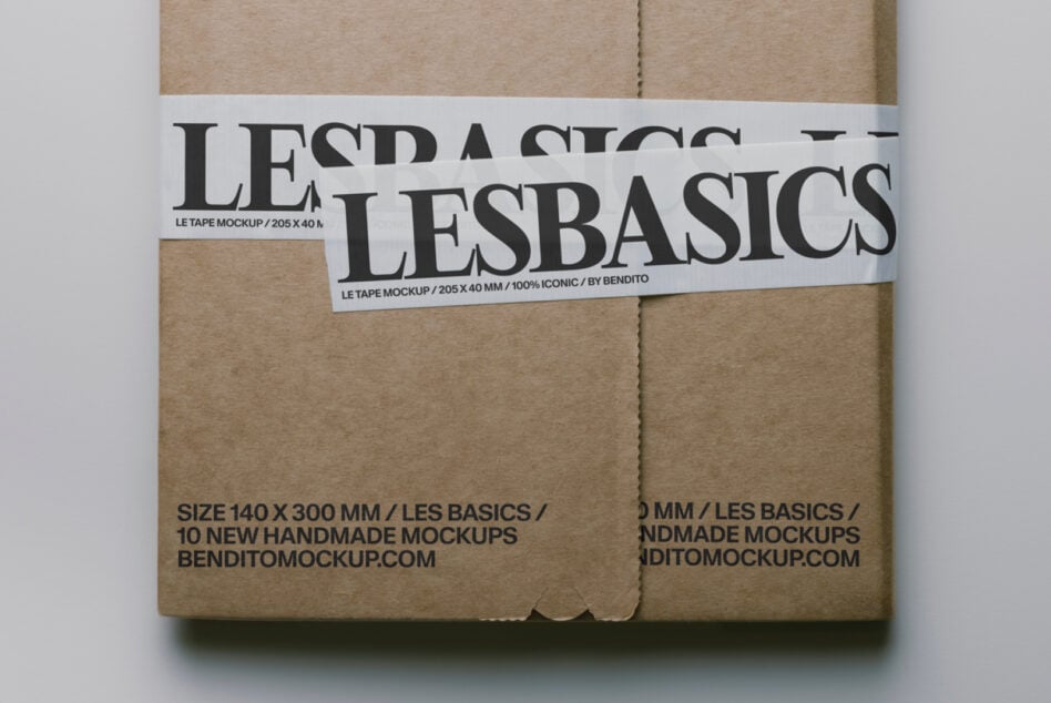 Kraft colored mailer mockup with Les Basics white tape label across middle