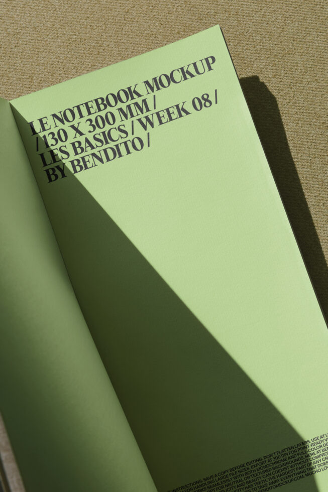 Lime green notebook mockup angled on linen fabric with sharp shadow