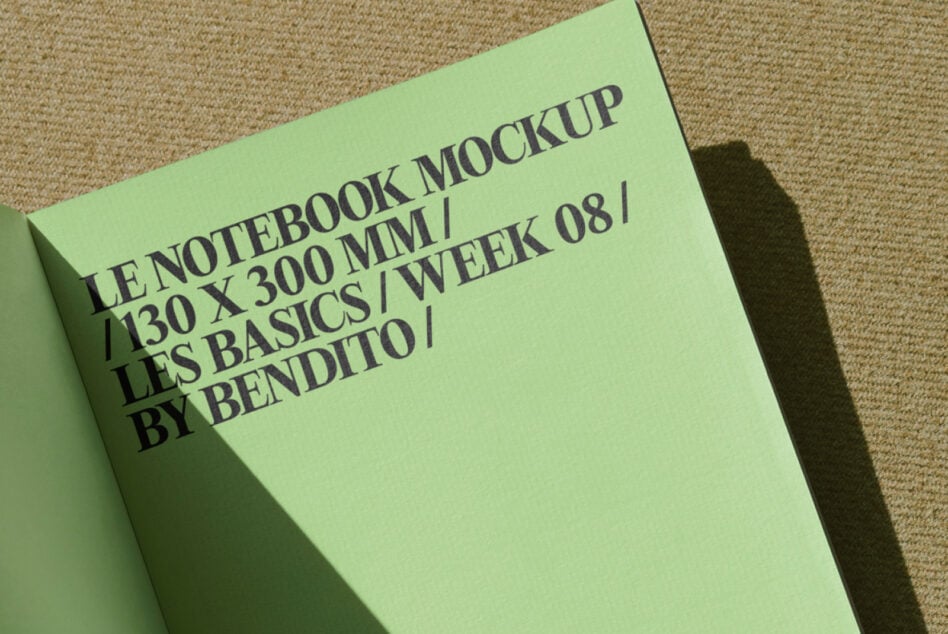 Chartreuse notebook mockup tilted on woven fabric showing front cover