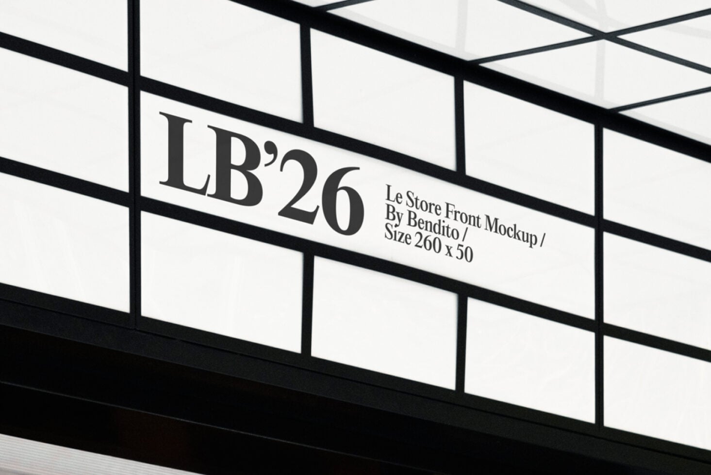 Minimalist storefront signage with grid windows displaying text LB'26