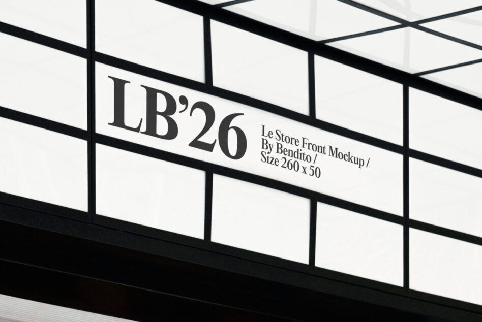Minimalist storefront signage with grid windows displaying text LB'26