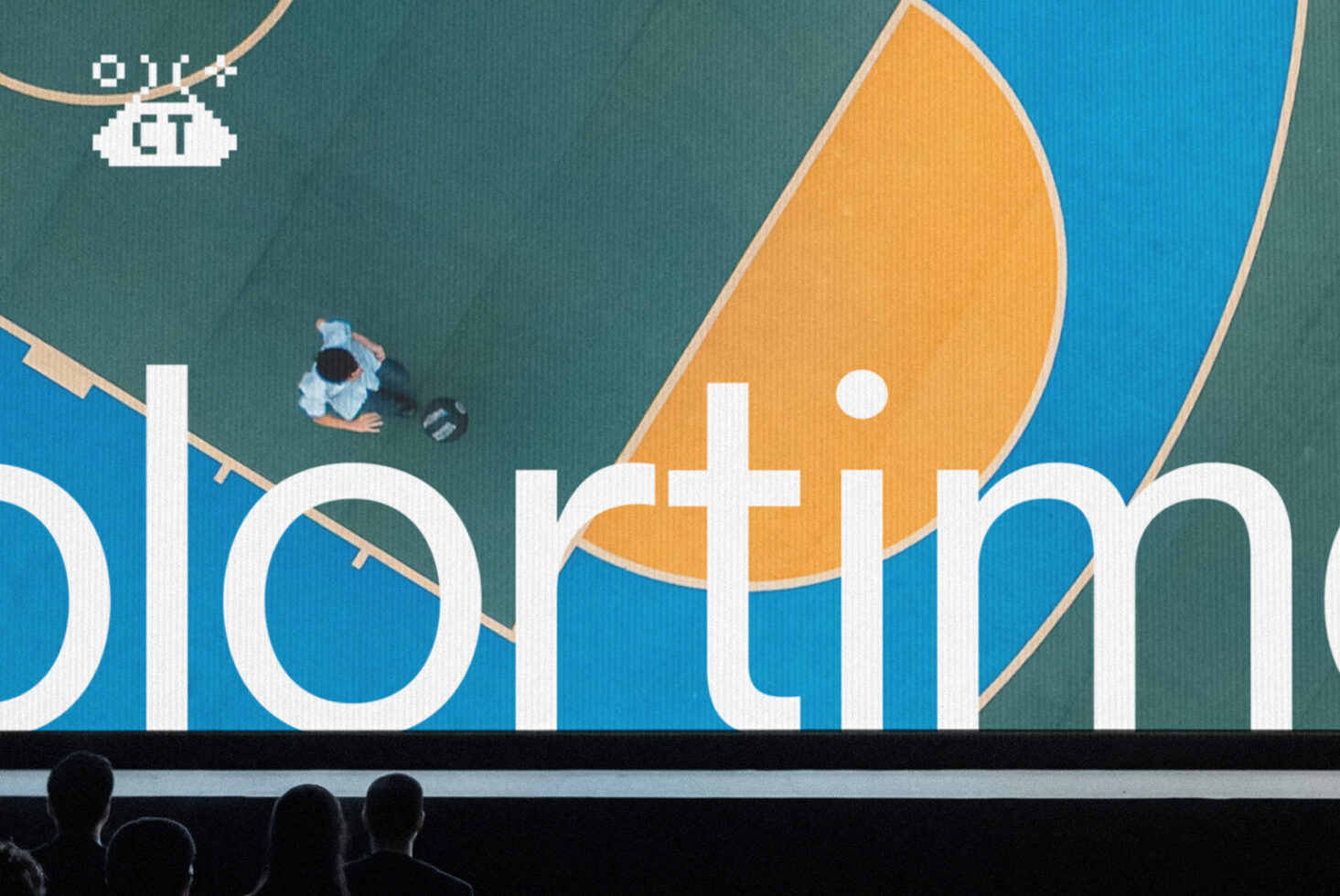 Colorful presentation screen with sailboat graphic, audience silhouettes below