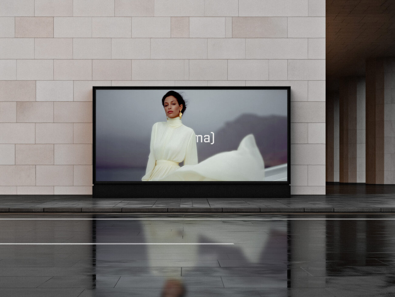 Wide screen display in modern gallery with woman in cream dress