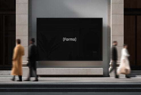 Forma branding on dark billboard in minimalist storefront with pedestrians