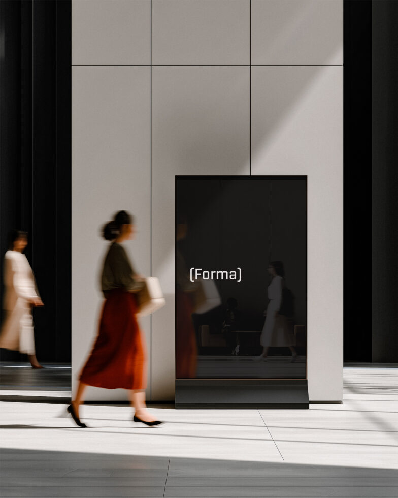 Blurred woman in red skirt passing black display kiosk in minimalist hallway