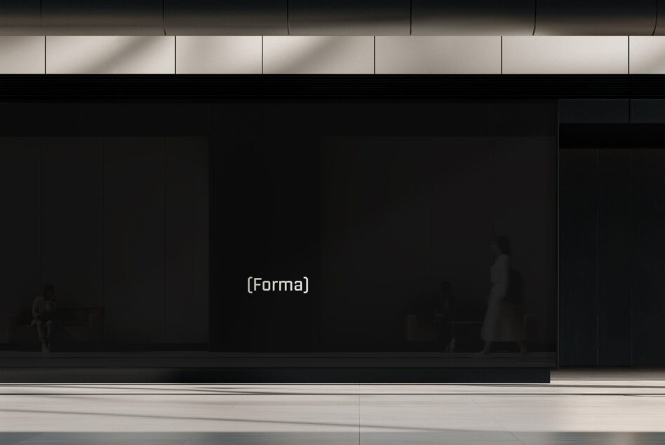 Dark storefront display with minimal signage in urban setting