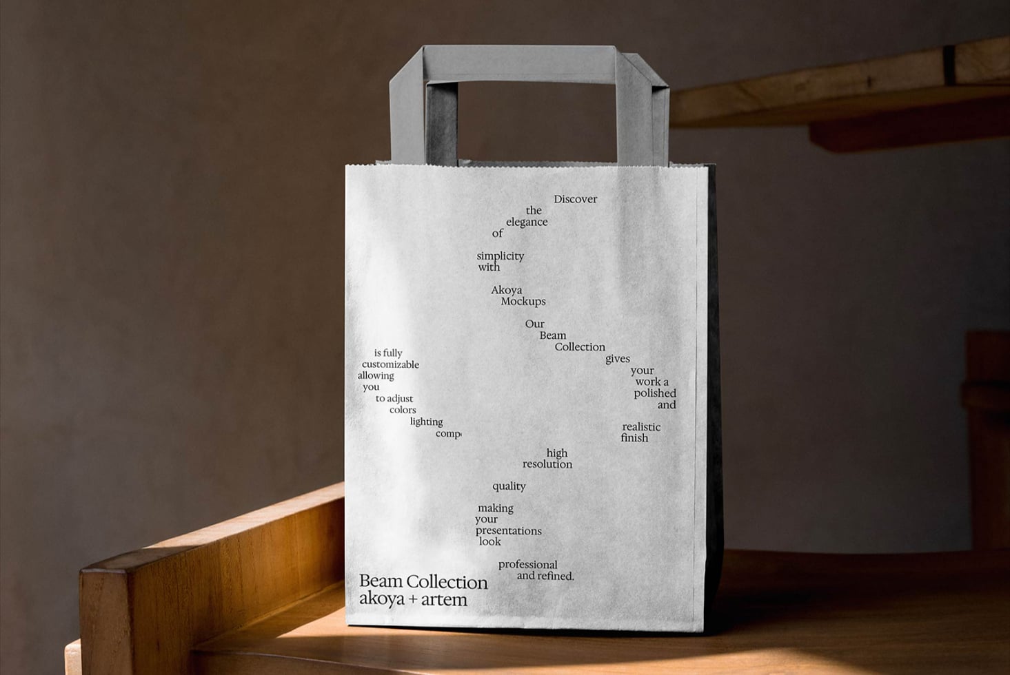 White kraft bag with Beam Collection text on wooden table in studio