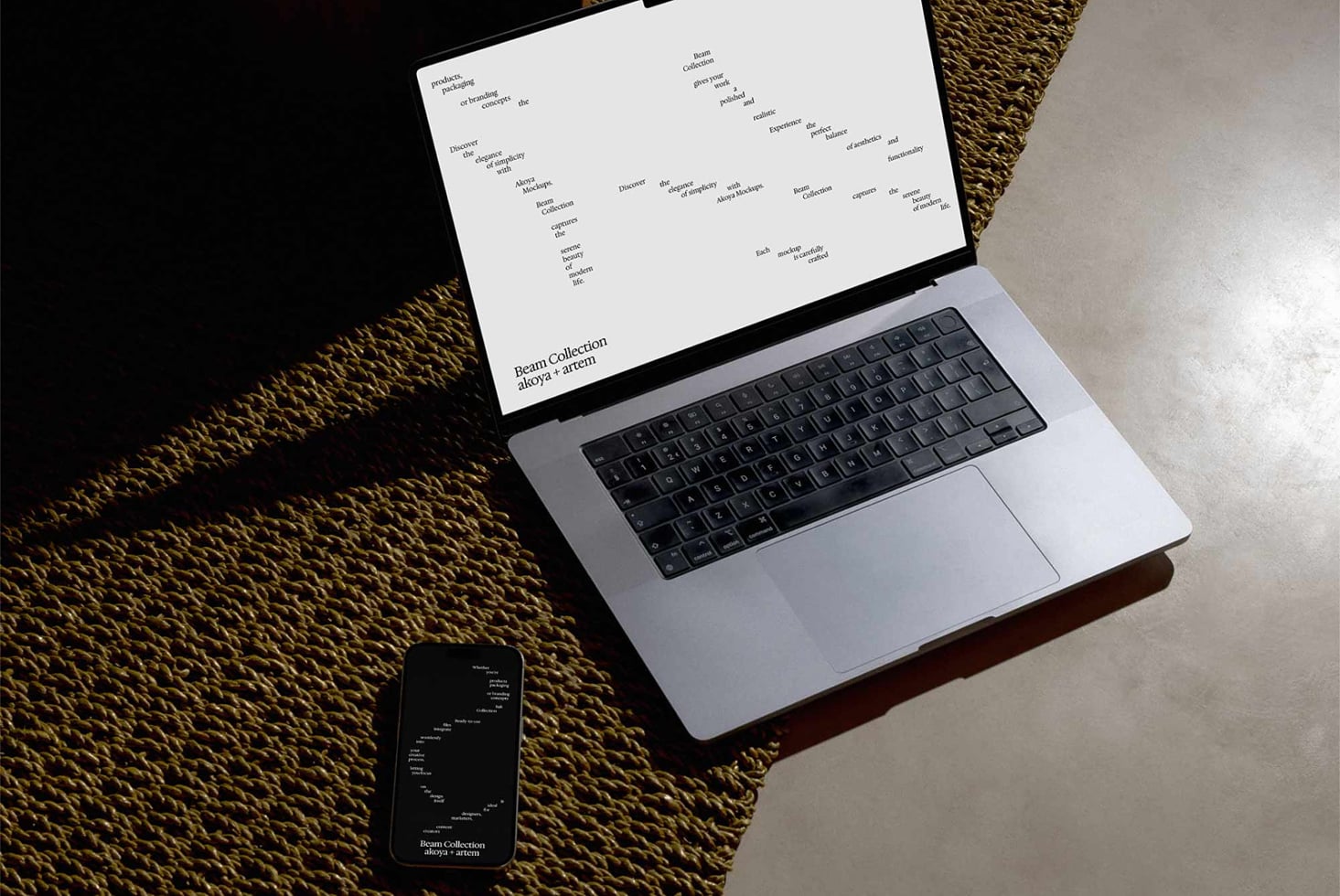 Laptop displaying light design layout, phone with matching light screen below