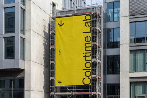 Bright yellow construction banner with ColorLab logo vertical orientation