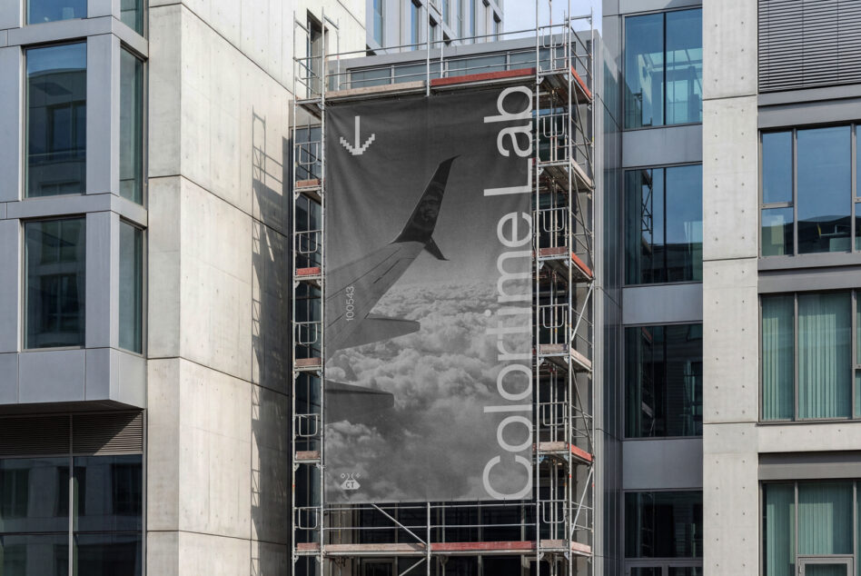 Gray construction banner showing airplane wing with ColorLab text