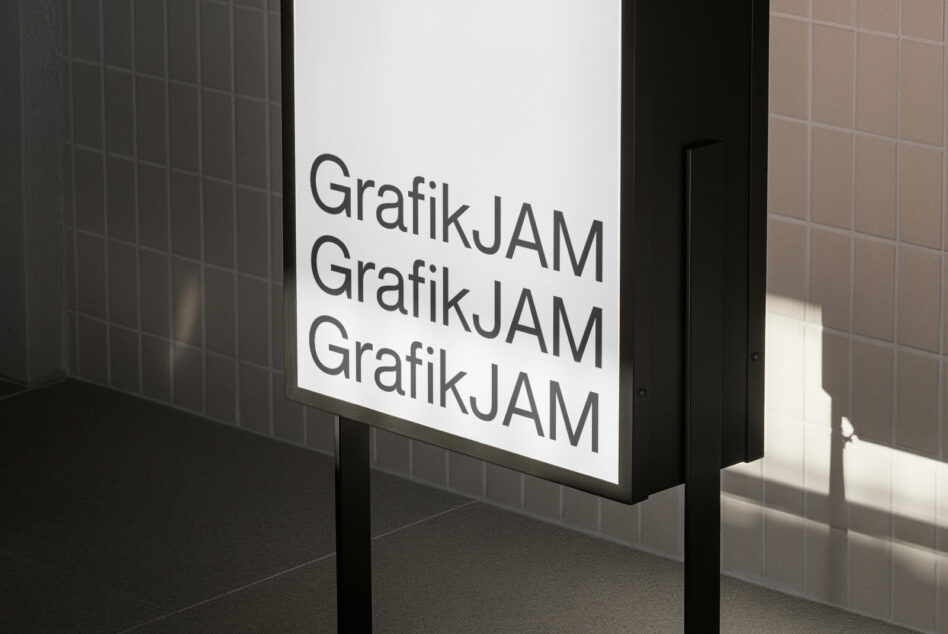 Repeating GrafikJAM text stacked vertically on white lightbox panel