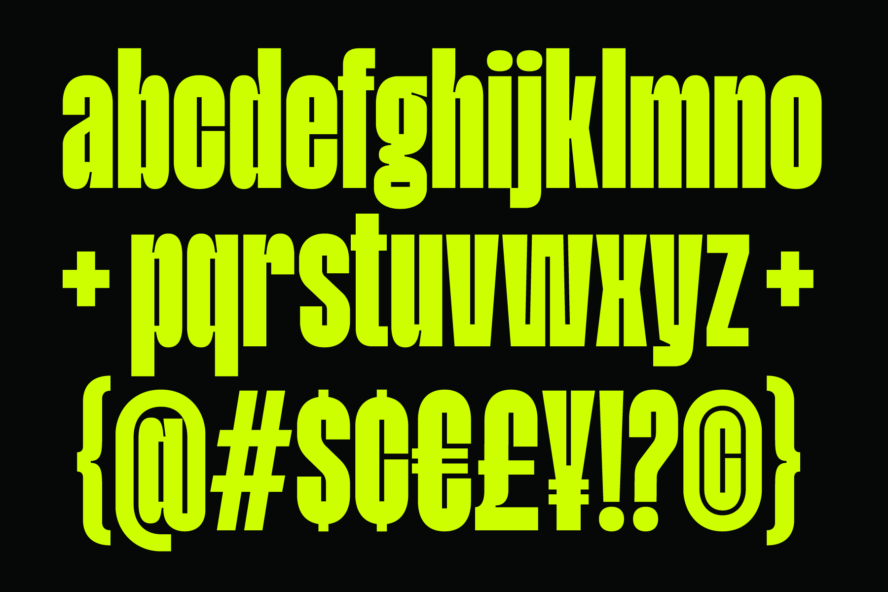 Neon yellow typeface showing full alphabet with special characters on black background