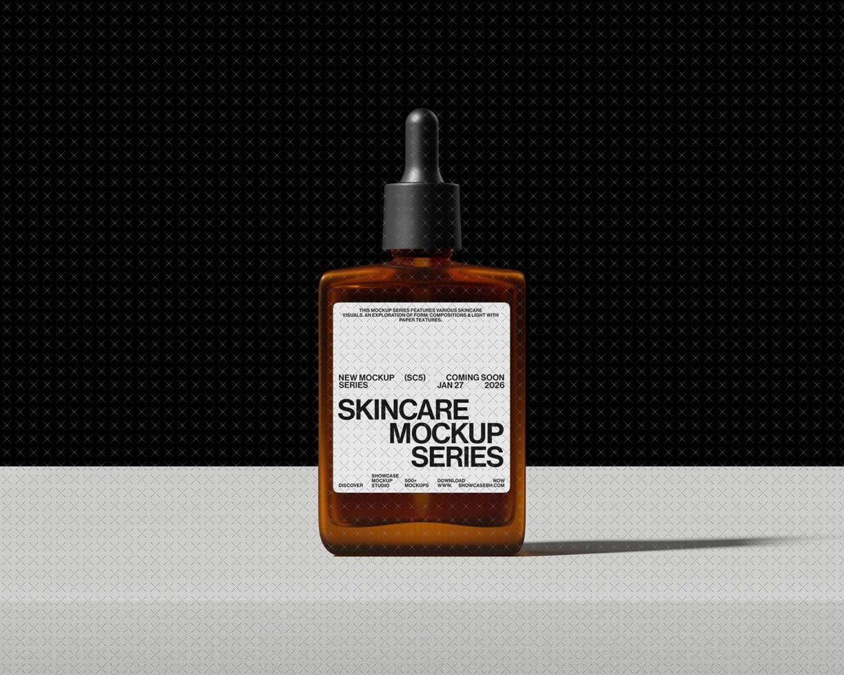Amber glass dropper bottle with white label on textured dark background
