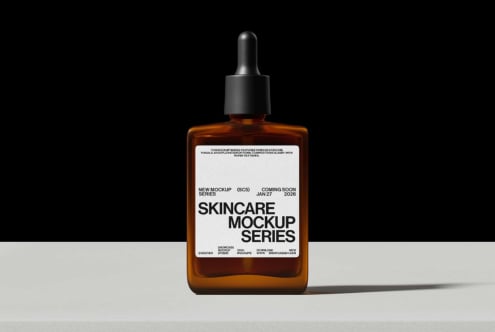 Amber dropper bottle with white label mockup, black dropper cap
