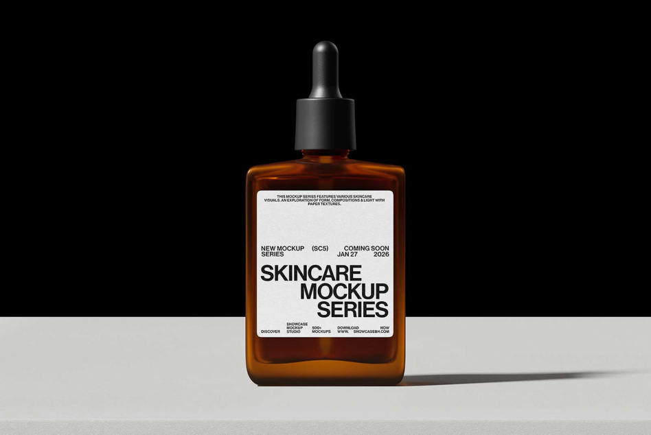 Amber dropper bottle with white label mockup, black dropper cap