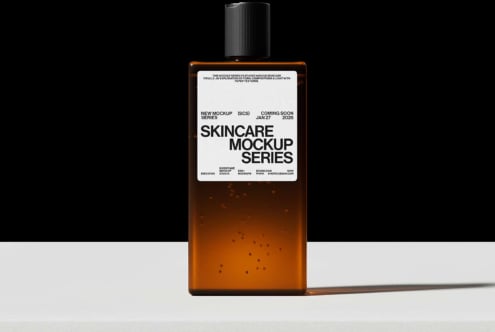 Amber glass bottle with white label mockup, black cap