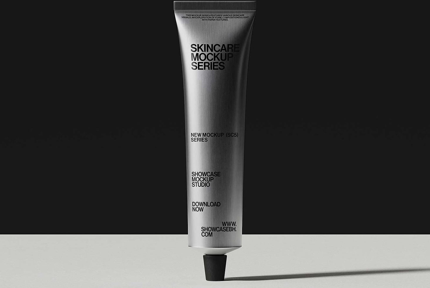 Silver tube with skincare mockup label on black backdrop