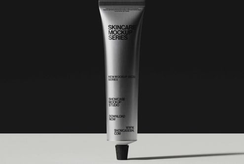 Silver tube with skincare mockup label on black backdrop