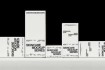 Monochrome box mockup series arranged horizontally on shelf