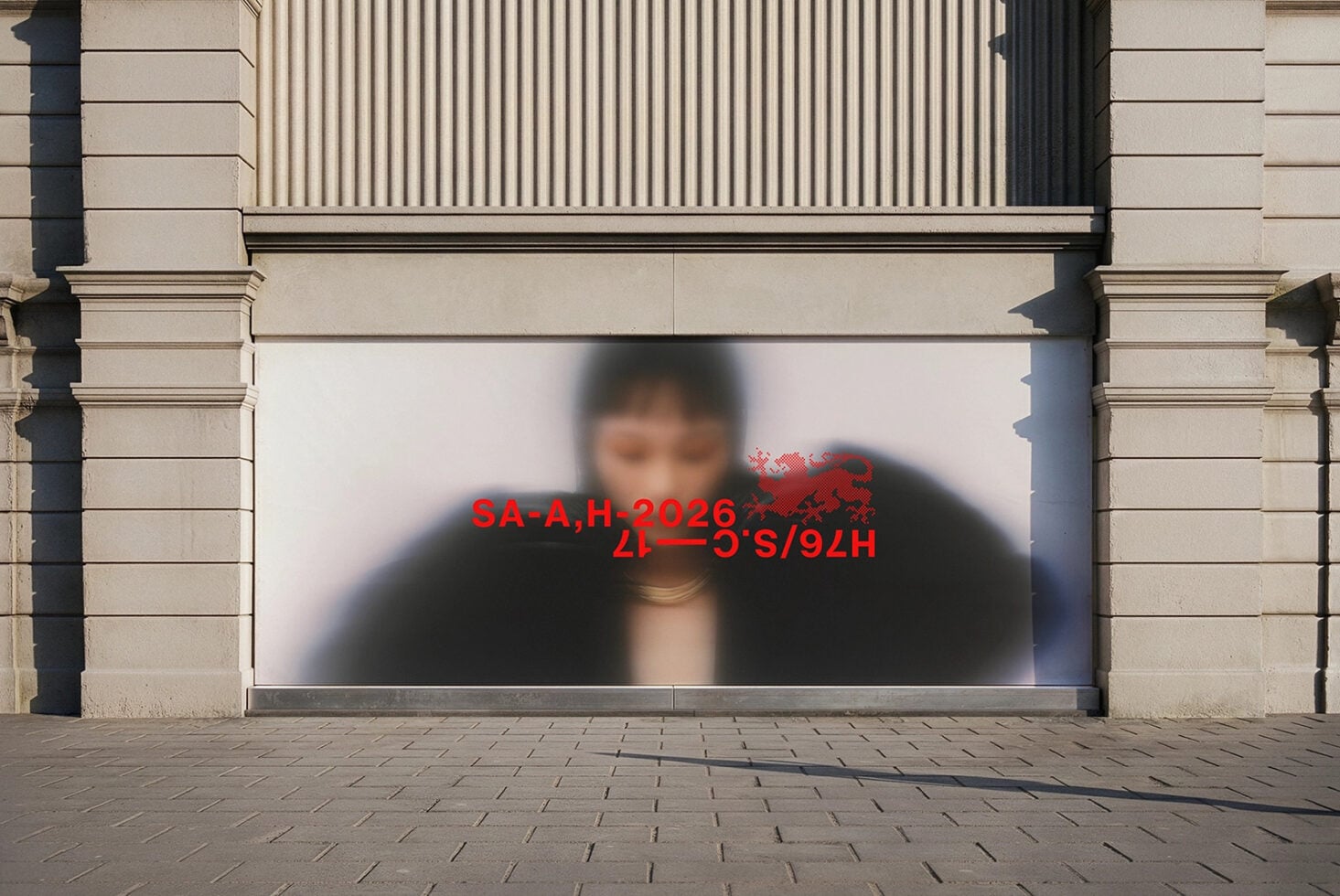 Store window with blurred person figure, red text overlay visible