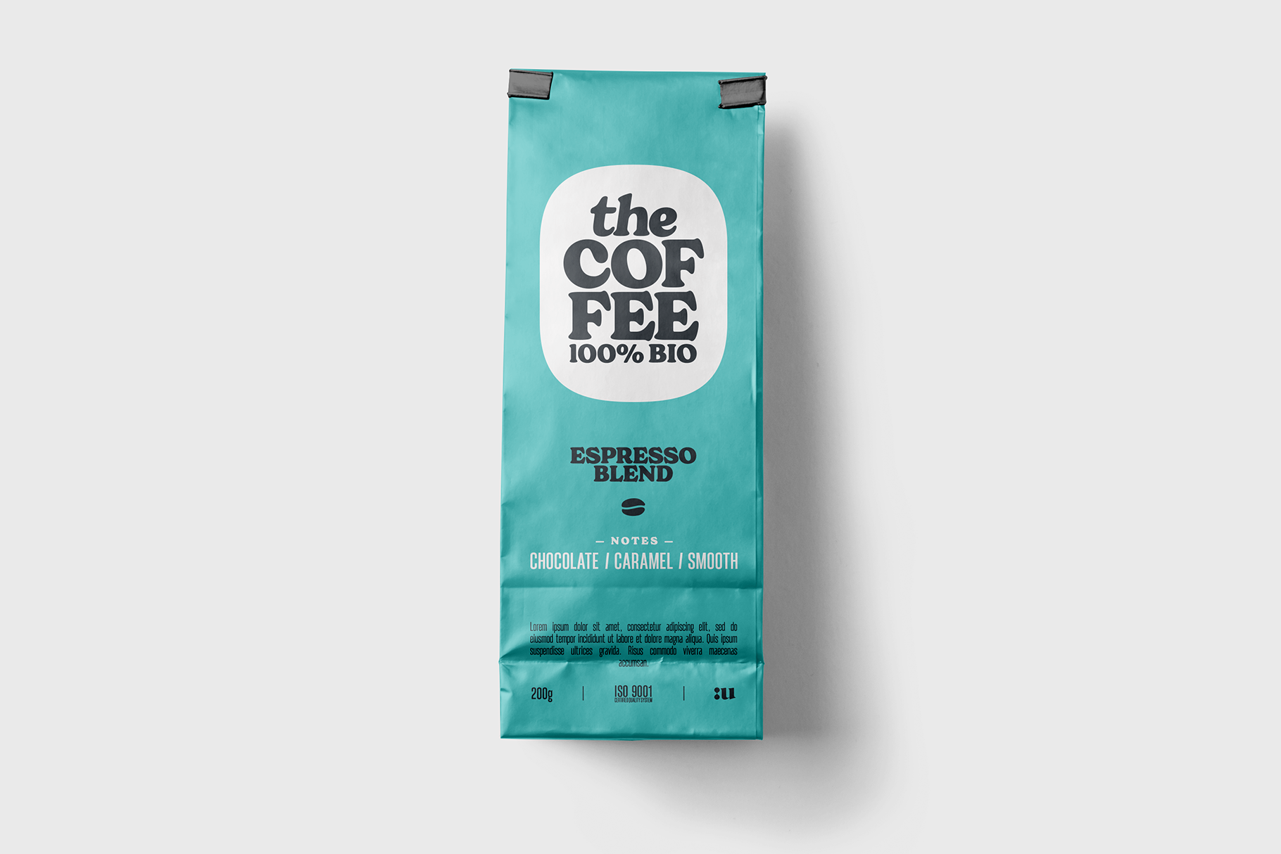 Turquoise coffee bag with white circle label for the Coffee 100% Bio espresso blend