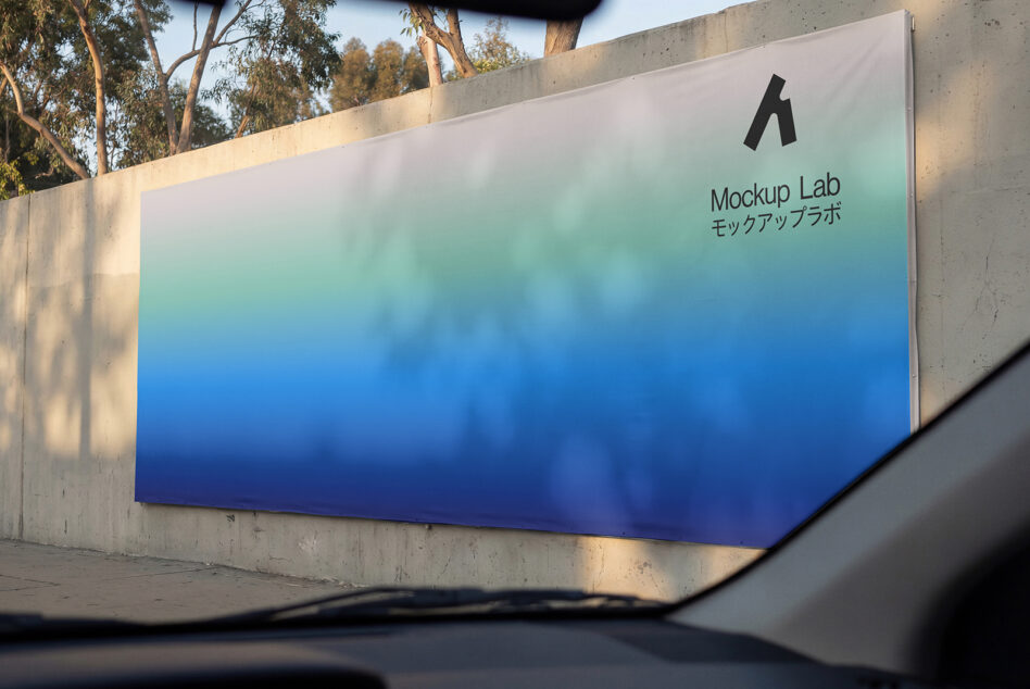 Outdoor concrete sign with blue gradient, Mockup Lab branding, architectural angle