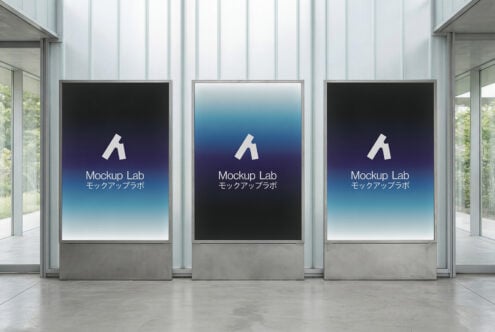 Three vertical digital billboards in a modern corridor with blue gradient displaying Mockup Lab logo