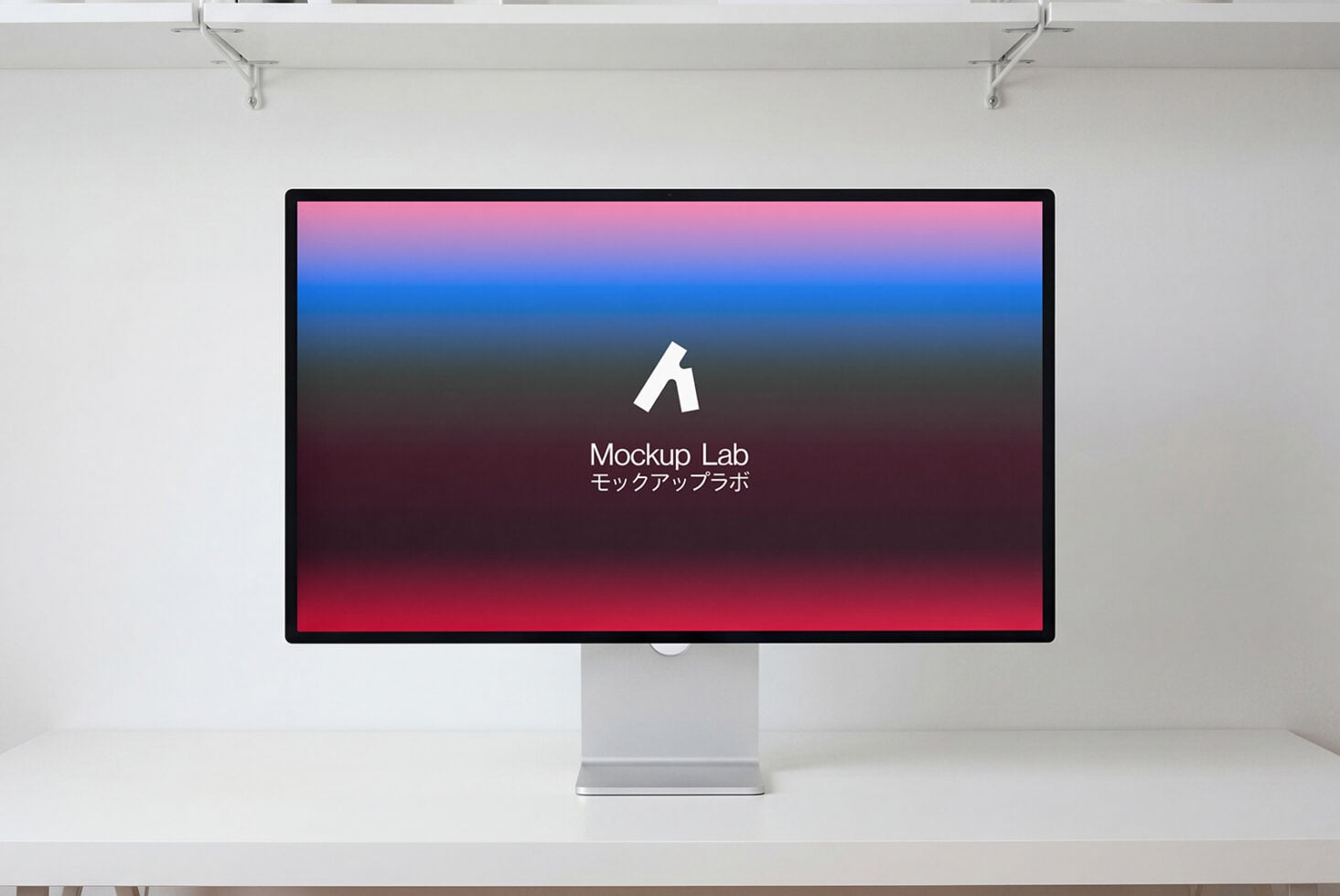 Desktop monitor showing red to blue gradient background with white logo