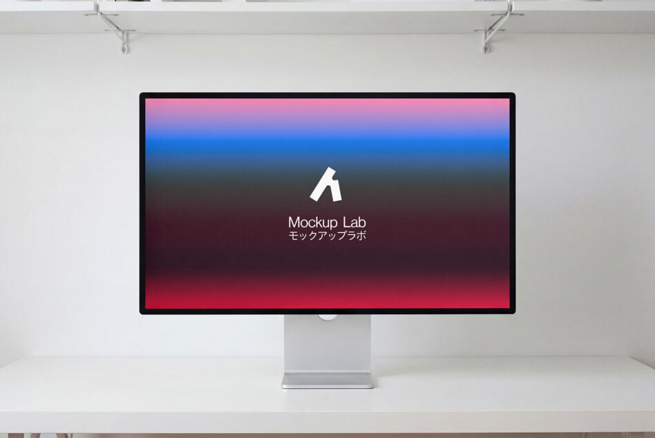 Desktop monitor showing red to blue gradient background with white logo