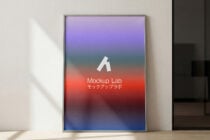 Framed poster with gradient from purple to red showing white logo on wall