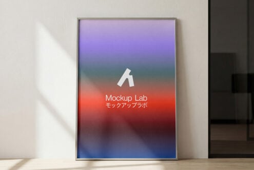 Framed poster with gradient from purple to red showing white logo on wall