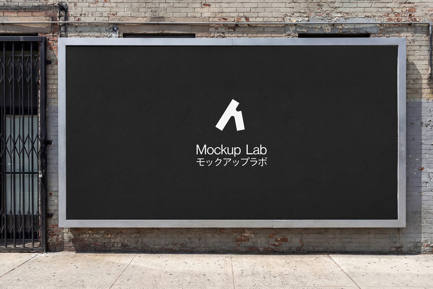 Storefront billboard on brick wall with black background showing white logo