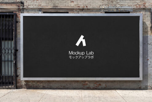 Storefront billboard on brick wall with black background showing white logo