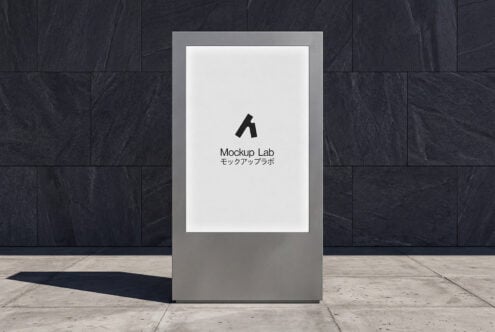 Street kiosk mockup with white screen centered against dark tile wall