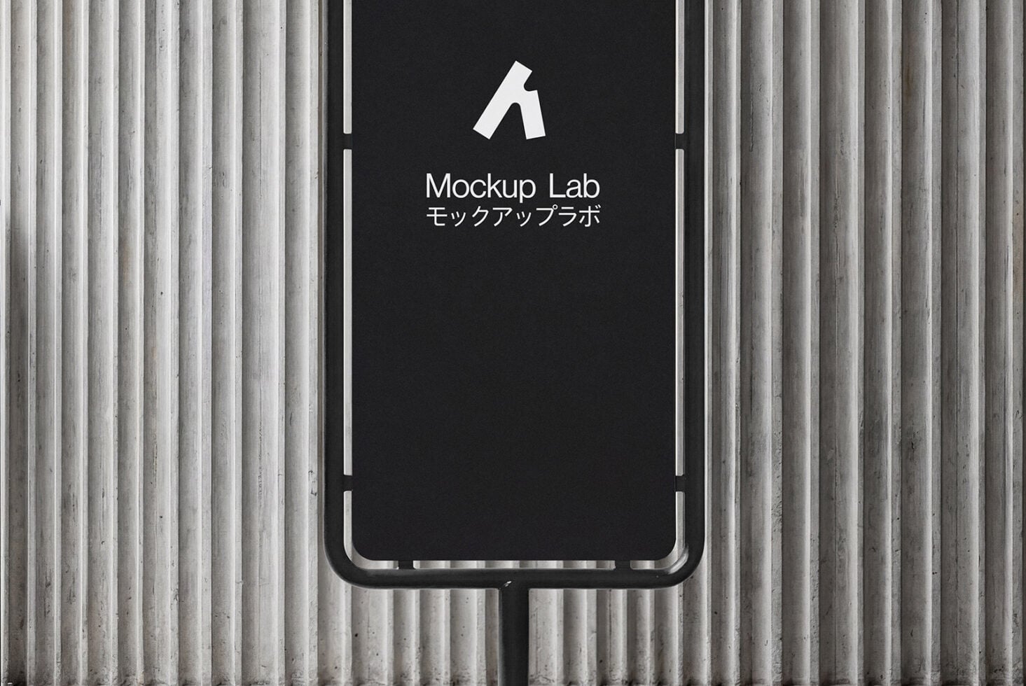 Black phone stand mockup with dark screen on concrete wall with vertical ridges texture
