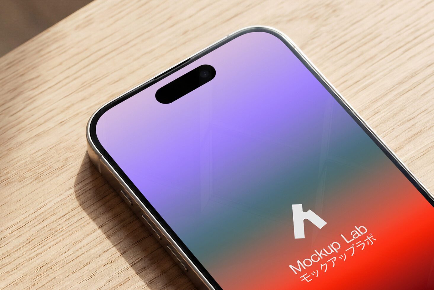 Phone mockup on wood surface showing colorful gradient display screen
