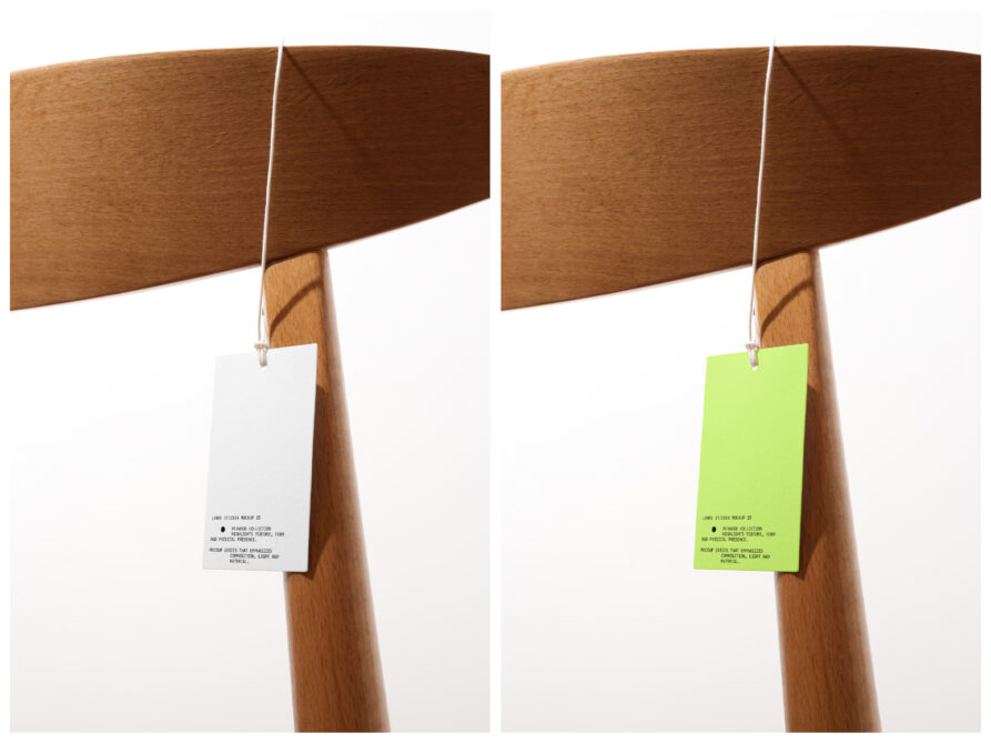 Hanging price tags in white then neon yellow on wooden coat rack